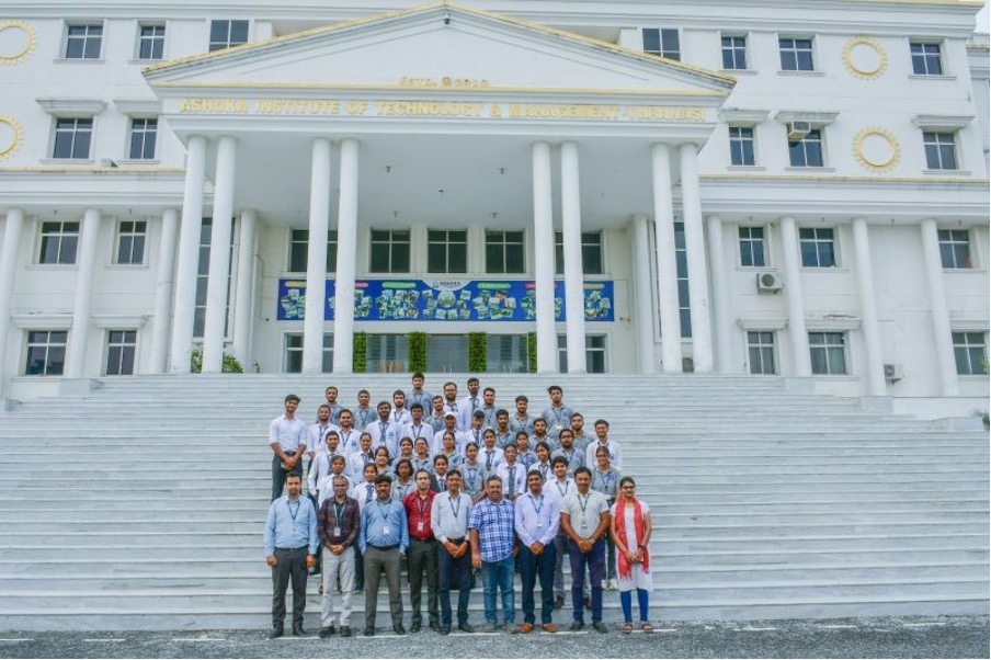Students assembled outside the main building of Ashoka Institute of Technology and Management, Varanasi